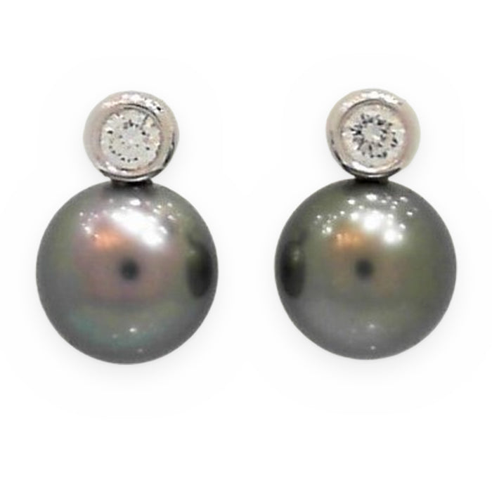 White gold Tahitian pearl stud earrings topped with bezel-set diamonds