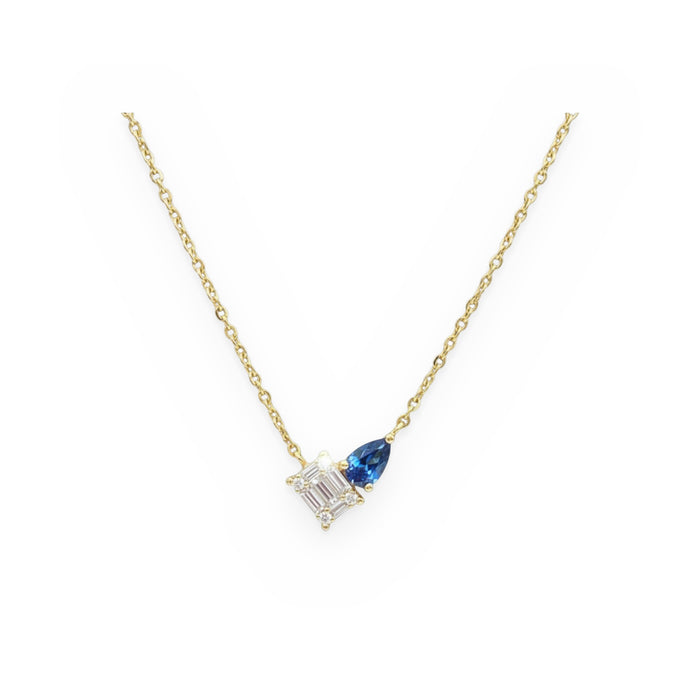 Yellow gold toi et moi necklace with a baguette diamond cluster and a blue sapphire pear