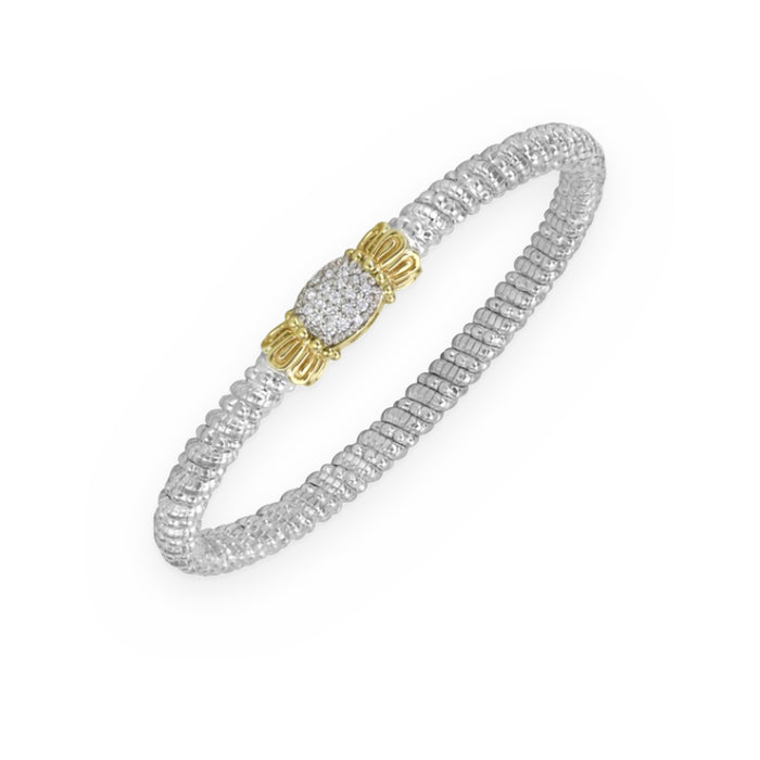 Two-tone silver and gold ribbed bangle bracelet with pave diamond center station